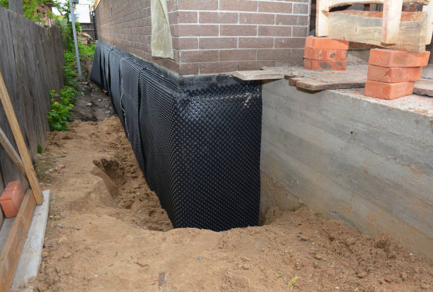 Happy homeowners after waterproofing job in Cardington